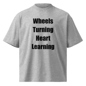 Wheels Turning Heart Learning T-Shirt | Organic High-Neck Oversize (Black Ink)